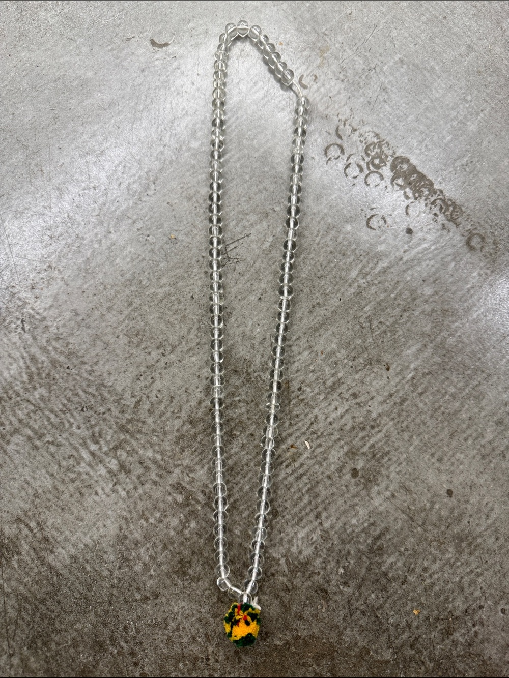 Clear Bead Necklace with Yellow Floral Charm